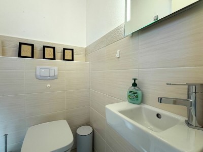 Holiday house Haus am Strand - Features photo 22