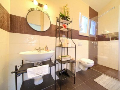 Holiday house Holiday house SEASCAPE II with heated pool near the sea - Features photo 14