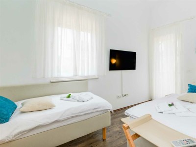 Holiday house Holiday house SEASCAPE II with heated pool near the sea - Features photo 18