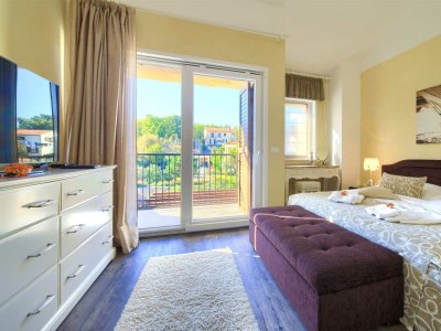 Holiday house Holiday house SEASCAPE II with heated pool near the sea - Features photo 40