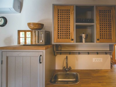 Holiday house Rustical holiday house Jela with swimming pool - Features photo 23