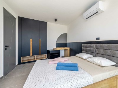 Villa Villa ELEVATION with heated pool - Features photo 25