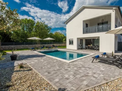 Holiday house Holiday house TARA & LANA II with heated pool in Kornić - Holiday house