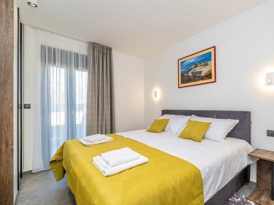 Holiday house Holiday house TARA & LANA II with heated pool - Features photo 18