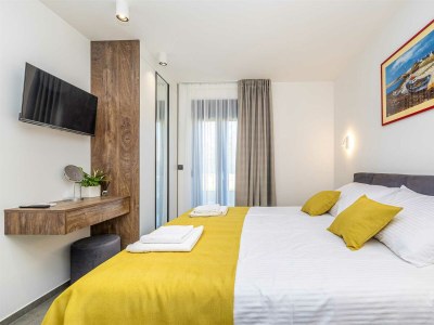 Holiday house Holiday house TARA & LANA II with heated pool - Features photo 19