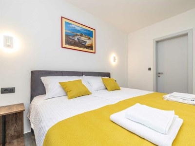 Holiday house Holiday house TARA & LANA II with heated pool - Features photo 20