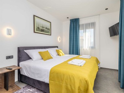 Holiday house Holiday house TARA & LANA II with heated pool - Features photo 24