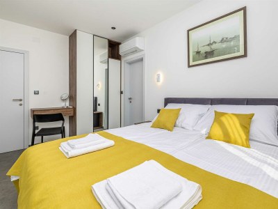 Holiday house Holiday house TARA & LANA II with heated pool - Features photo 25