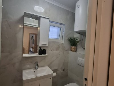 Apartment Apartment Jakić - One Bedroom Apartment with Garden View - Features photo 12