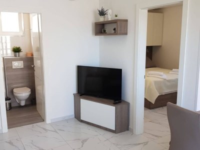 Apartment One-Bedroom Deluxe City View Apartment - Features photo 5