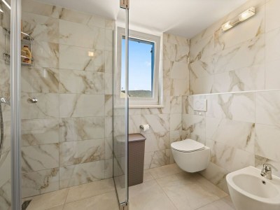 Apartment Bezauberndes Sommerapartment mit Meerblick - Features photo 15