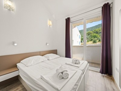 Apartment Bezauberndes Sommerapartment mit Meerblick - Features photo 19