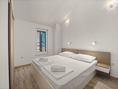 Apartment Bezauberndes Sommerapartment mit Meerblick - Features photo 21