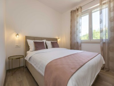 Apartment Apartment in Labin with Pool & Beach Nearby - Features photo 12