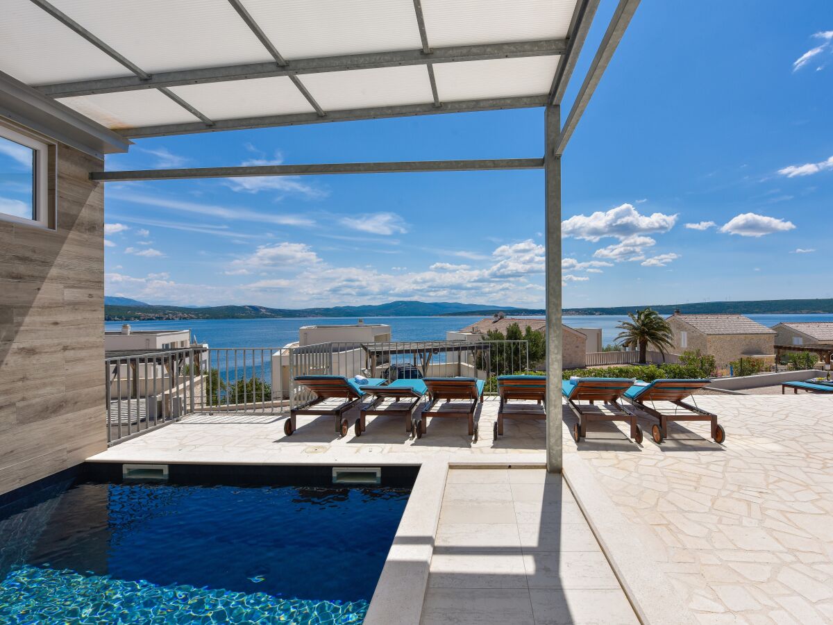 Holiday house Four-bedroom house with terrace and sea view Posedarje, Novigrad K-24091