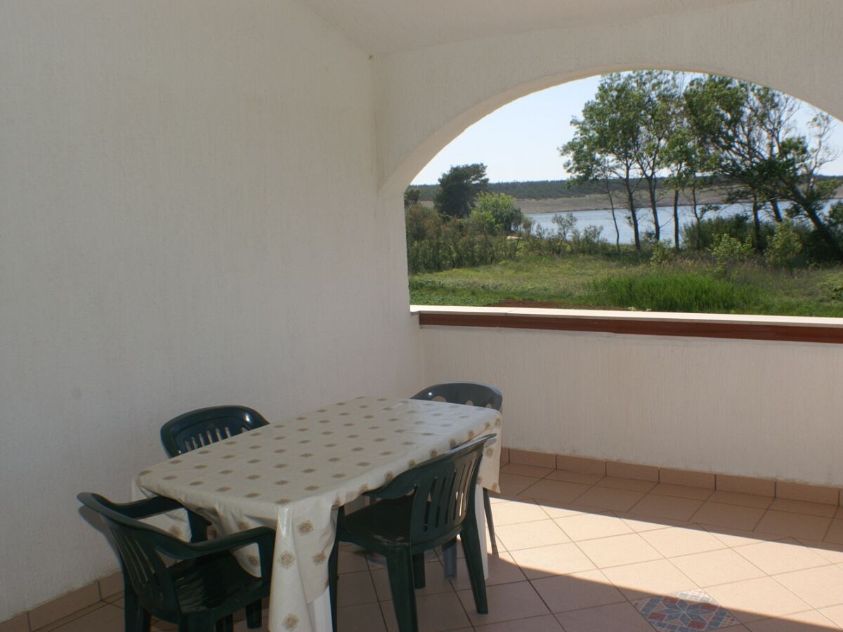 Apartment Two bedroom apartment with terrace and sea view Povljana, Pag A-230-c