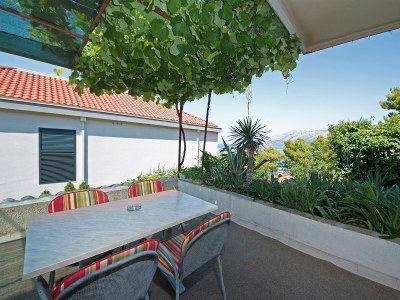 Apartment Three bedroom apartment with terrace and sea view Brela, Makarska A-20778-b - Outdoor photo 31