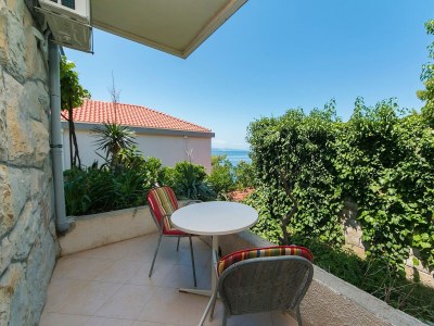 Apartment Three bedroom apartment with terrace and sea view Brela, Makarska A-20778-b - Outdoor photo 35