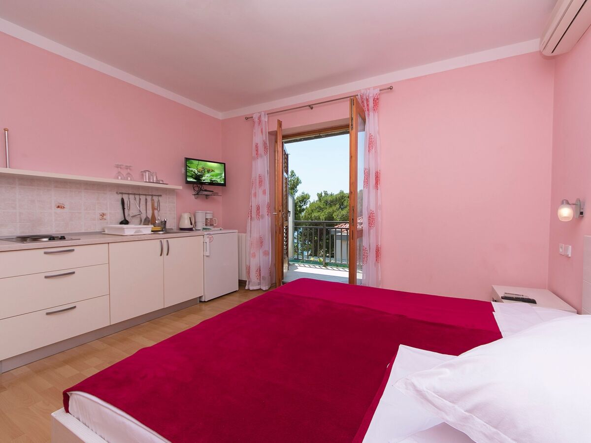 Apartment Studio flat with balcony and sea view Brela, Makarska AS-20778-b