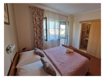 Apartment Three bedroom apartment with terrace and sea view Barbat, Rab A-21809-a - Outdoor photo 9