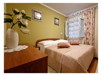 Apartment Three bedroom apartment with terrace and sea view Barbat, Rab A-21809-a - Outdoor photo 14