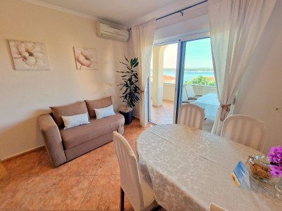 Apartment Two bedroom apartment with terrace and sea view Barbat, Rab A-21809-b - Outdoor photo 8