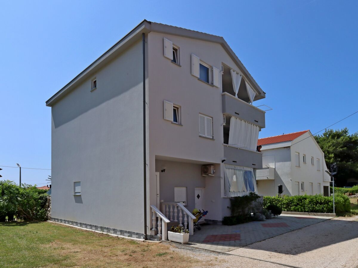 Apartment Two bedroom apartment with balcony Barbat, Rab A-24547-b - Outdoor photo 4