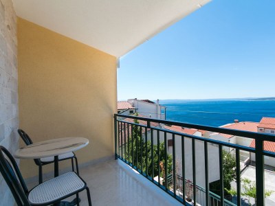 Holiday room with balcony and sea view Brela, Makarska S-2717-a - Outdoor photo 14