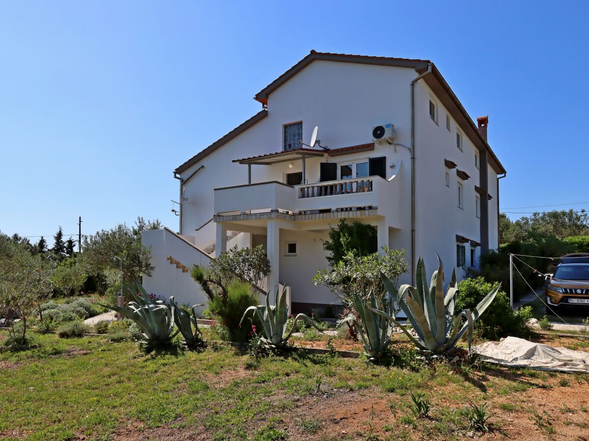 Apartment Two bedroom apartment with terrace and sea view Barbat, Rab A-14247-a - Outdoor photo 5