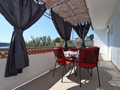 Apartment Two bedroom apartment with terrace and sea view Barbat, Rab A-14247-a in Rab - Apartment