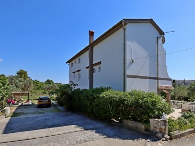 Apartment Two bedroom apartment with terrace and sea view Barbat, Rab A-14247-a - Outdoor photo 6