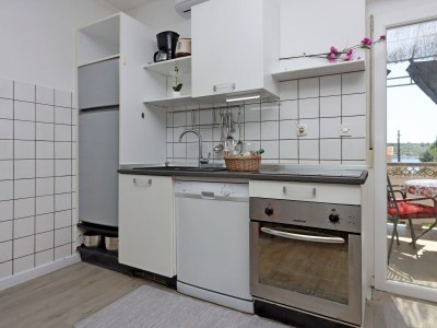 Apartment Two bedroom apartment with terrace and sea view Barbat, Rab A-14247-a - Outdoor photo 17