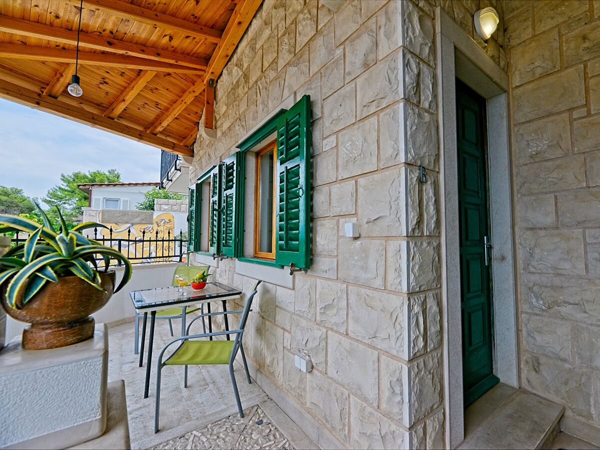 Apartment One bedroom apartment with terrace and sea view Postira, Brač A-2913-b