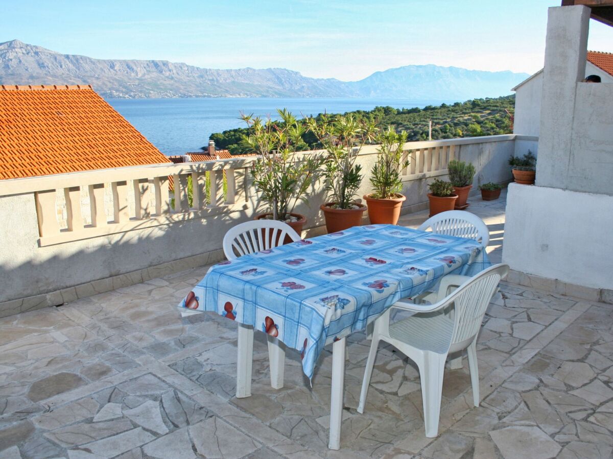 Apartment One bedroom apartment with terrace and sea view Postira, Brač A-2919-a