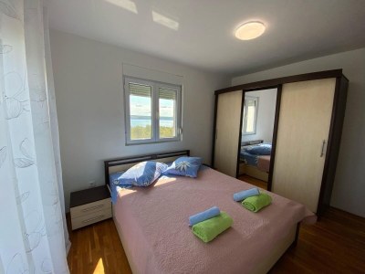 Apartment Two bedroom apartment with terrace and sea view Maslenica, Novigrad A-12636-a - Outdoor photo 11