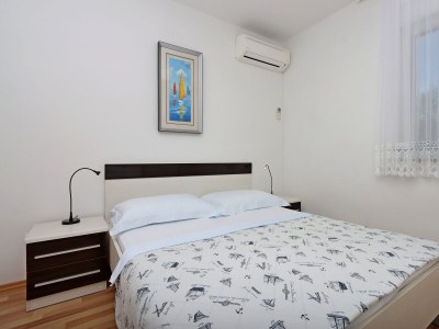 Apartment Two bedroom apartment with terrace Banjol, Rab A-12838-a - Outdoor photo 21