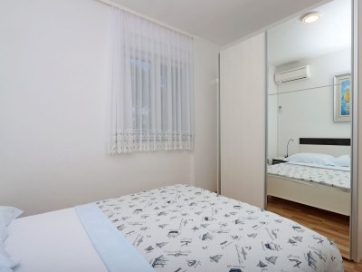 Apartment Two bedroom apartment with terrace Banjol, Rab A-12838-a - Outdoor photo 22