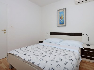 Apartment Two bedroom apartment with terrace Banjol, Rab A-12838-a - Outdoor photo 23