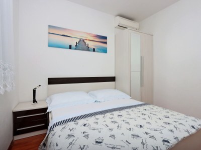 Apartment Two bedroom apartment with terrace Banjol, Rab A-12838-a - Outdoor photo 25