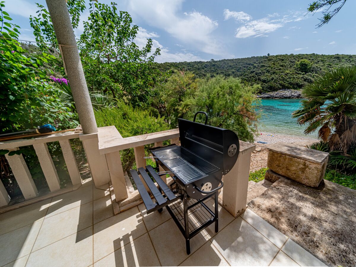 Holiday house Four-bedroom house near beach Cove Rasohatica, Korčula K-4386