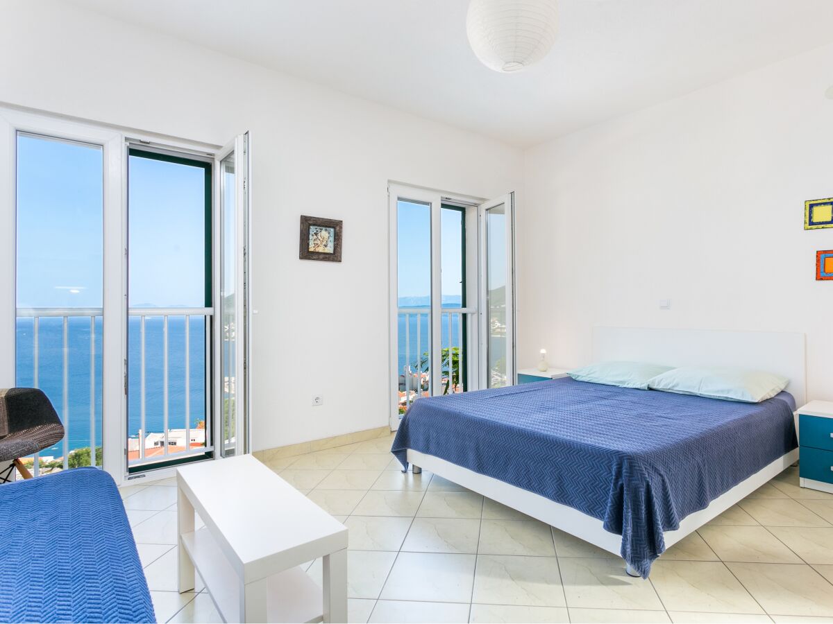 Holiday house Two bedroom house with terrace and sea view Igrane, Makarska K-8332