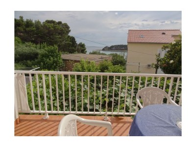 Apartment Two bedroom apartment with terrace and sea view Rab A-16359-a - Outdoor photo 11