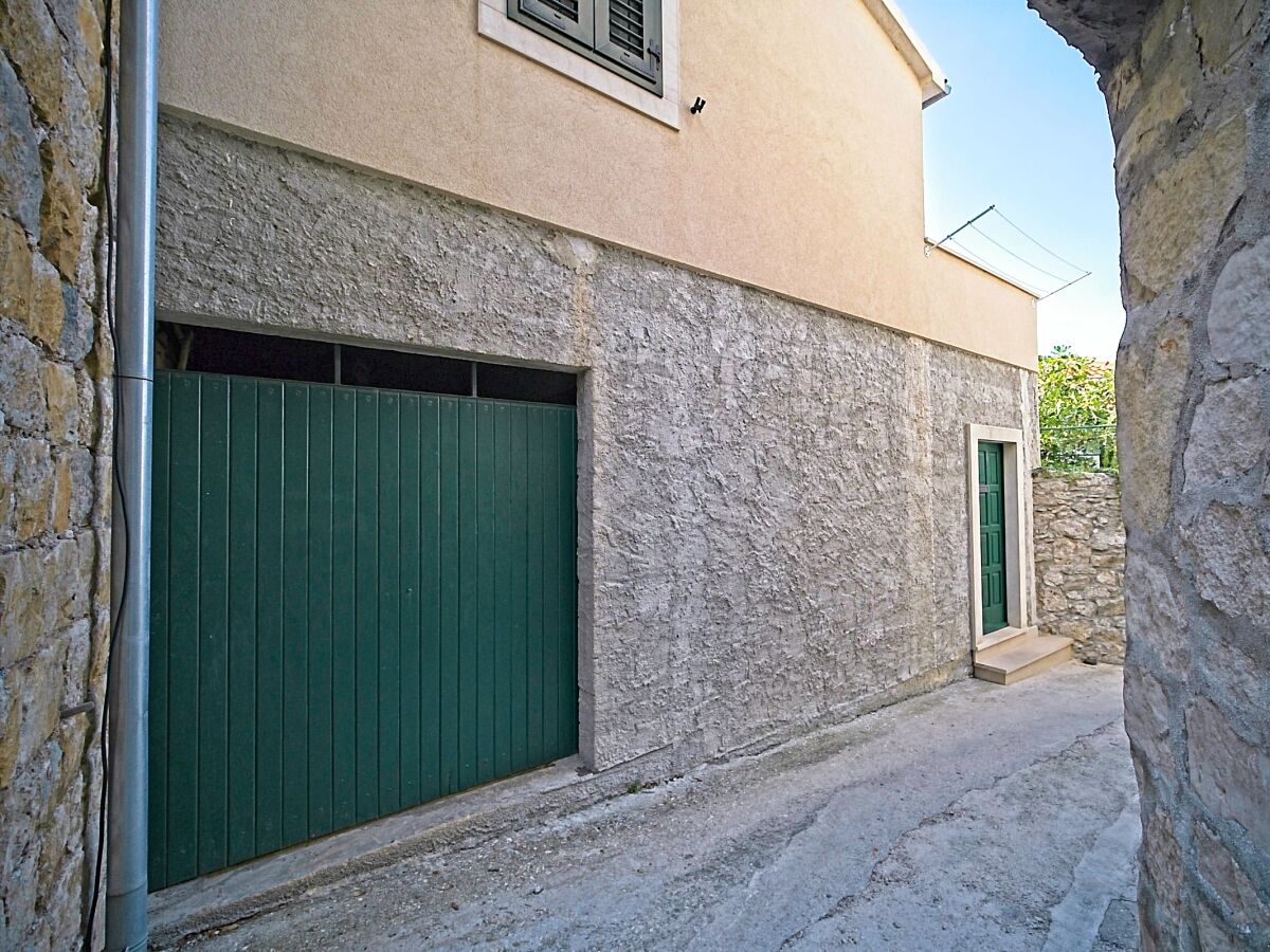 Apartment Two bedroom apartment with terrace and sea view Postira, Brač A-22030-a - Outdoor photo 3