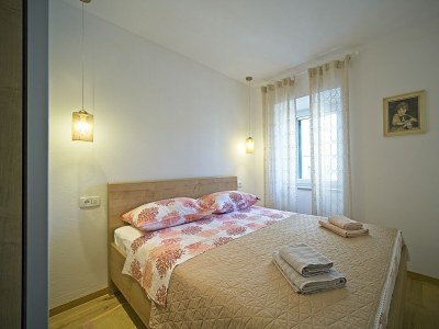 Apartment Two bedroom apartment with terrace and sea view Postira, Brač A-22030-a - Outdoor photo 13