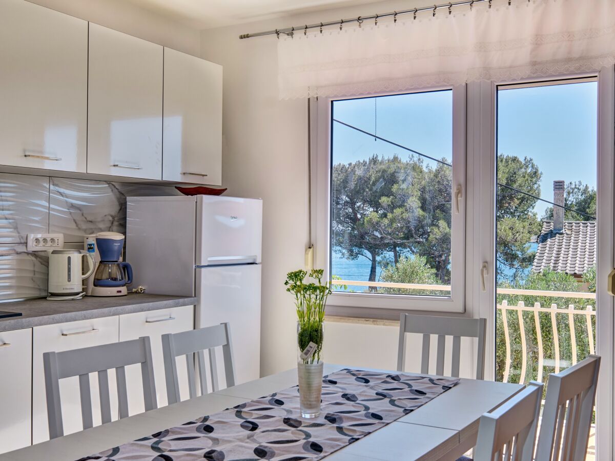 Apartment Three bedroom apartment with balcony and sea view Martinšćica, Cres A-23222-a