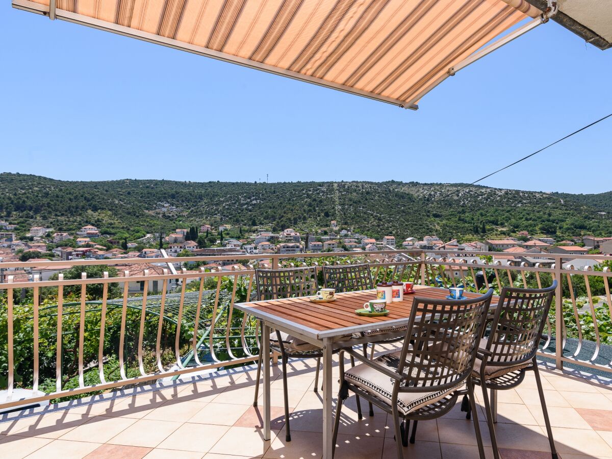 Apartment Three bedroom apartment with terrace and sea view Marina, Trogir A-23353-a