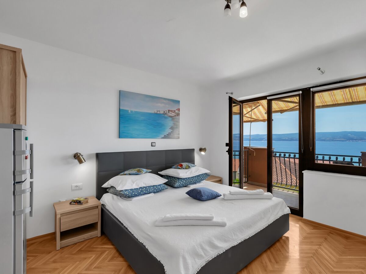 Holiday room with balcony and sea view Duće, Omiš S-10303-e