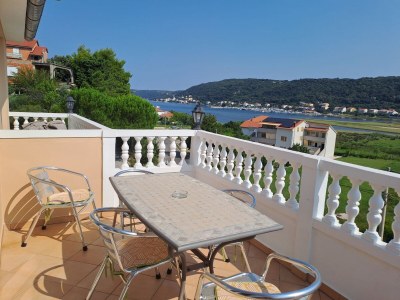 Apartment Two bedroom apartment with terrace and sea view Supetarska Draga - Donja, Rab A-14425-d in Rab - Apartment