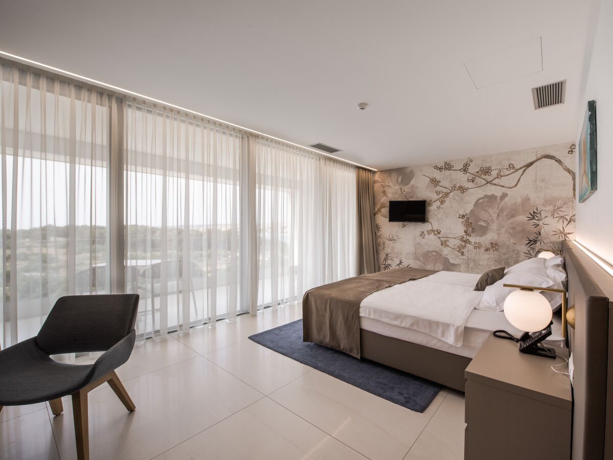 Apartment Studio flat with balcony and sea view Novalja, Pag AS-15882-a