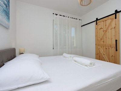 Apartment Two bedroom apartment with terrace Kampor, Rab A-17396-a - Outdoor photo 19